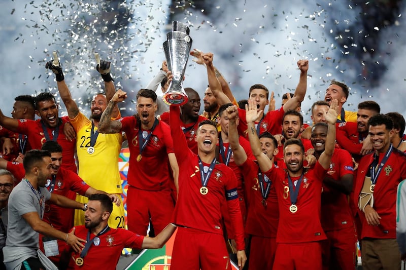 Cristiano Ronaldo lifts the Nations League trophy after Portugal beat the Netherlands in the final. Reuters