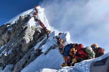 Deaths on Mount Everest this year have been blamed on lengthy queues as a record number of climbers scaled the peak AP