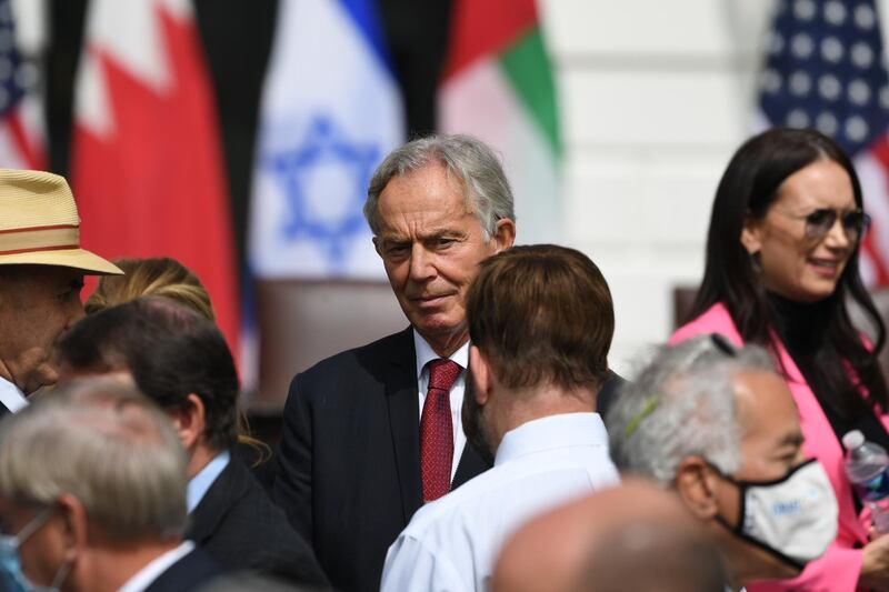 Former British Prime Minister Tony Blair arrives before Israeli Prime Minister Benjamin Netanyahu, Bahrain Foreign Minister Abdullatif al-Zayani and UAE Foreign Minister Abdullah bin Zayed Al-Nahyan take part in the signing of the Abraham Accords where the countries of Bahrain and the United Arab Emirates recognize Israel, on the South Lawn of the White House in Washington, DC, September 15, 2020. - Israeli Prime Minister Benjamin Netanyahu and the foreign ministers of Bahrain and the United Arab Emirates arrived September 15, 2020 at the White House to sign historic accords normalizing ties between the Jewish and Arab states. (Photo by SAUL LOEB / AFP)