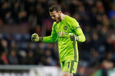 Soccer Football - Premier League - Burnley v Manchester United - Turf Moor, Burnley, Britain - December 28, 2019 Manchester United's David de Gea celebrates after Marcus Rashford scores their second goal Action Images via Reuters/Craig Brough EDITORIAL USE ONLY. No use with unauthorized audio, video, data, fixture lists, club/league logos or "live" services. Online in-match use limited to 75 images, no video emulation. No use in betting, games or single club/league/player publications. Please contact your account representative for further details.