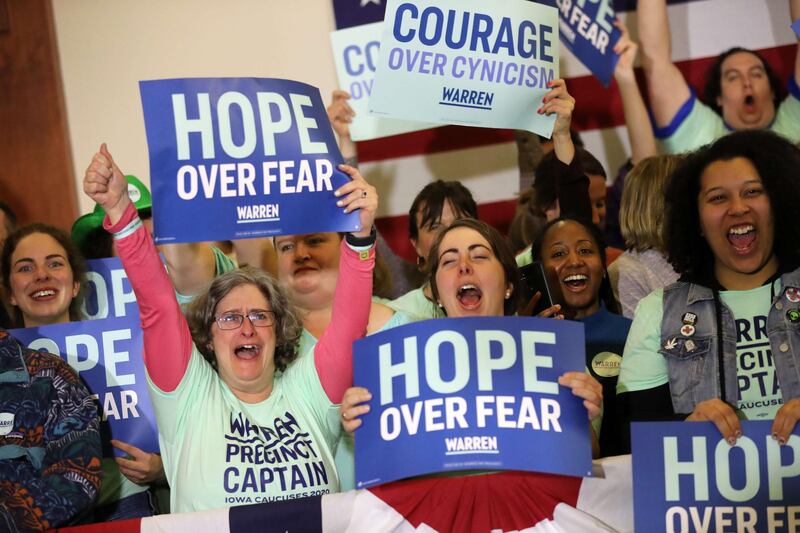 Supporters of presidential candidate Elizabeth Warren cheer during her caucus night watch party in Des Moines, Iowa.  Getty Images