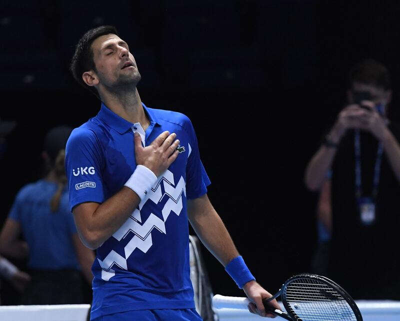 Djokovic celebrates making the last four. EPA