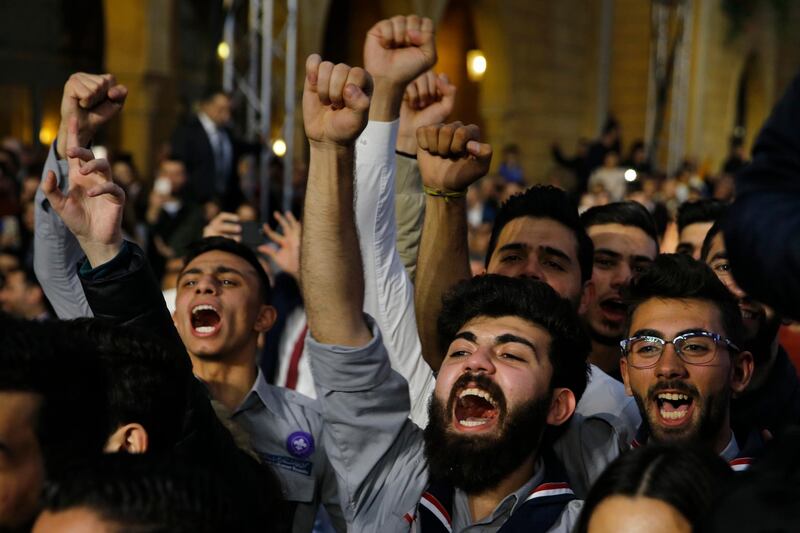 Supporters of former Lebanese Prime Minister Saad Hariri, chant slogans as they listen to him, during a ceremony to mark the 15th anniversary of the assassination of his father, former Prime Minister Rafik Hariri, in Beirut, Lebanon. AP Photo