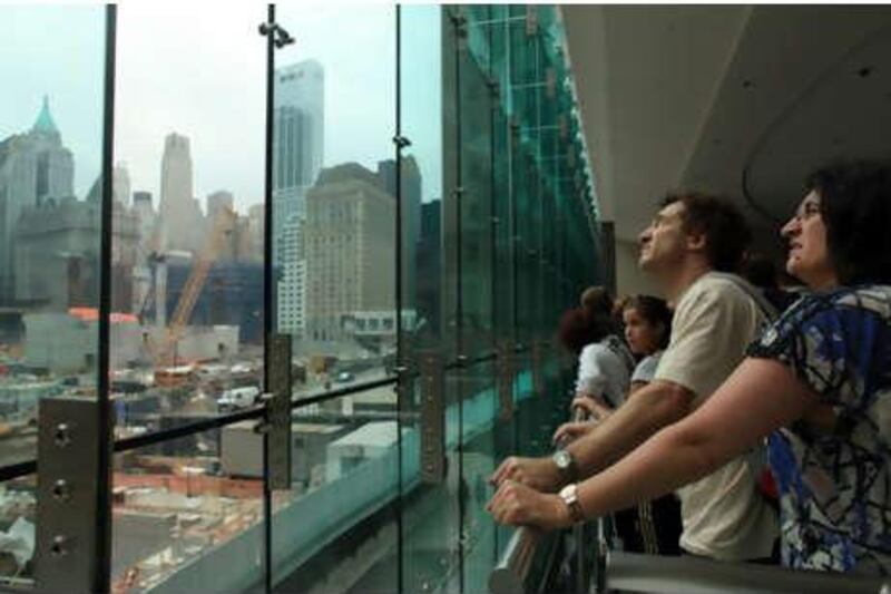 Visitors watch construction at the World Trade Center site. The attacks in 2001 sparked curiosity in students to learn more about Arabs.