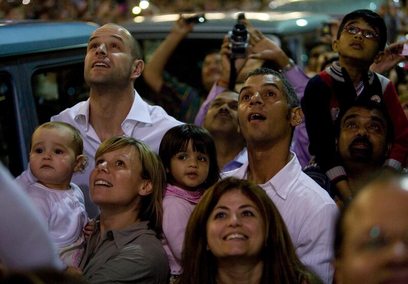 United Arab Emirates - Dubai - Jan 04 - 2010 : People watch fireworks during the opening ceremony of the Burj Khalifa building. ( Jaime Puebla / The National ) 
EDITORS NOTE: Building was opened at 8pm on January 4th, 2010 at which point the name changed from Burj Dubai to Burj Khalifa. Official name is now Burj Khalifa *** Local Caption ***  JP Burj Khalifa 03.jpg