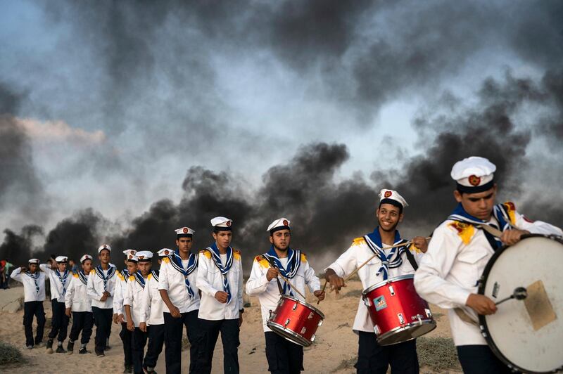 Palestinian scouts march during a protest on the beach near the border with Israel in Beit Lahiya, northern Gaza Strip. Felipe Dana/AP Photo