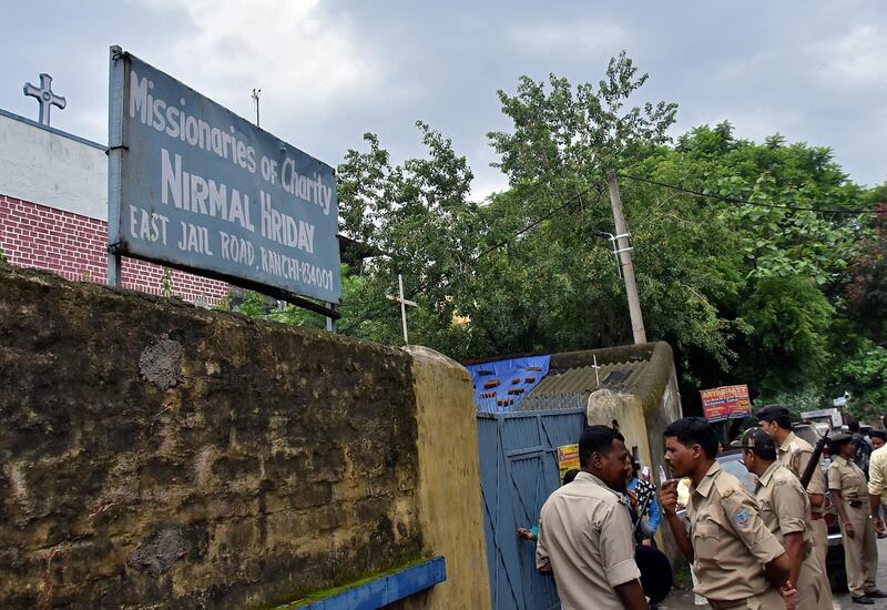 FILE PHOTO: Police stand outside a home which provides shelter for pregnant unmarried women run by the Missionaries of Charity, a Roman Catholic order founded by Mother Teresa, in Ranchi, India, July 4, 2018. REUTERS/Stringer/File photo