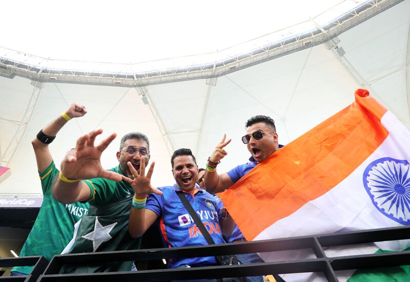 Pakistan and India fans at the Dubai International Stadium. Chris Whiteoak / The National