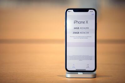 epa06305244 The new iPhone X is displayed at an Apple store during its launch at Dubai Mall in Dubai, UAE, 03 November 2017. Apple's new iPhone X goes on sale in more than 55 countries and territories on 03 November.  EPA/MAHMOUD KHALED