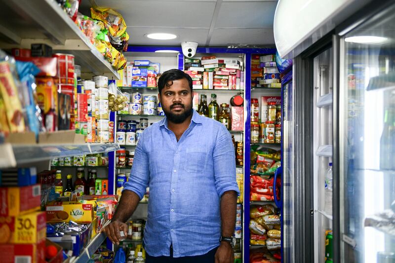 Shihab Kadavanda, manager of Ahla Zahra Groceries said most of their customers are staying at home. Khushnum Bhandari / The National