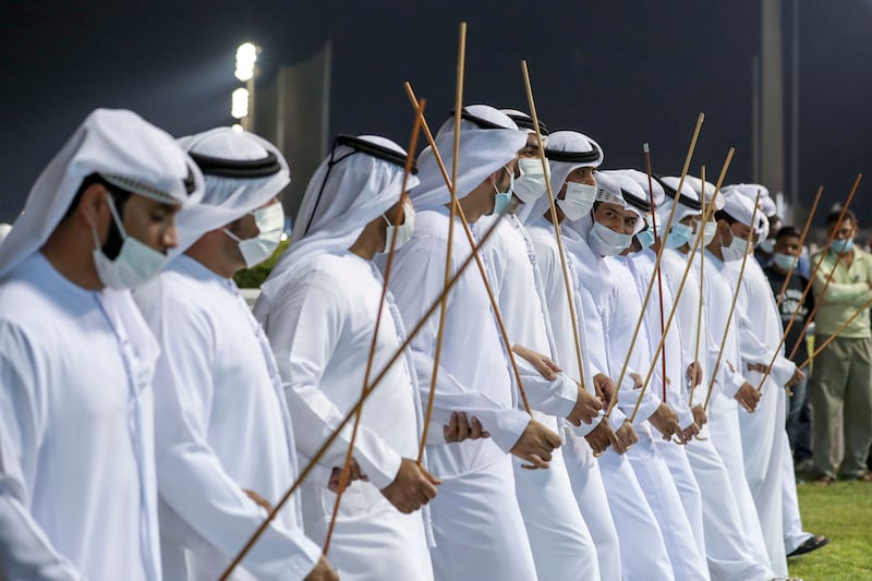Traditional Emirati dancing during the Sheikh Zayed bin Sultan Al Nayhan Jewel Crown Race Meeting 2021 at the Abu Dhabi Equestrian Club. All photos: Khushnum Bhandari / The National
