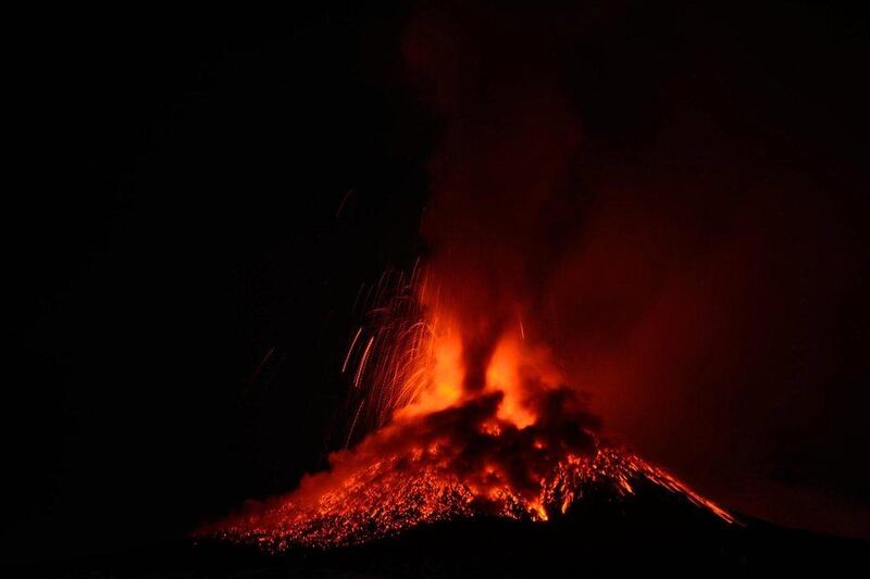 Mount Etna, one of the most active volcanoes in the world, erupts on the east coast of the southern Italian island of Sicily. Davide Caudillo /  EPA
