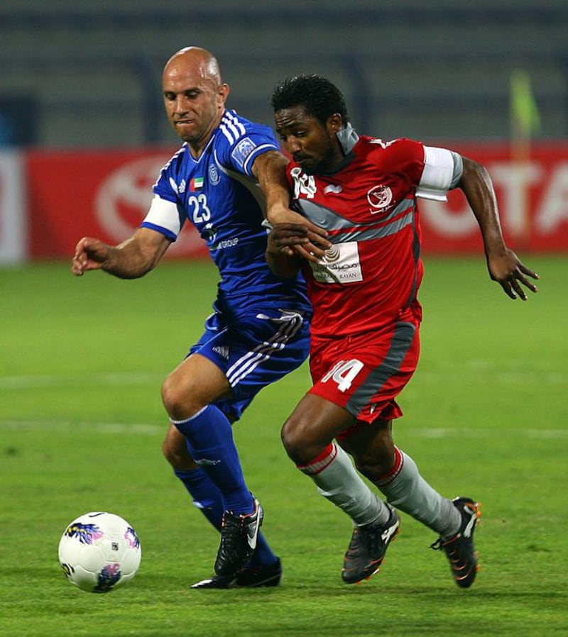 Bakari Kone, right, played for Lekhwiya in Dubai in March 2012, against Al Nasr in the AFC Champions League. Satish Kumar / The National