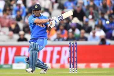 MANCHESTER, ENGLAND - JULY 10: MS Dhoni of India bats during resumption of the Semi-Final match of the ICC Cricket World Cup 2019 between India and New Zealand after weather affected play at Old Trafford on July 10, 2019 in Manchester, England. (Photo by Nathan Stirk/Getty Images)