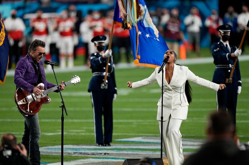 Eric Church and Jazmine Sullivan performs the national anthem before the NFL Super Bowl 55 football game. AP