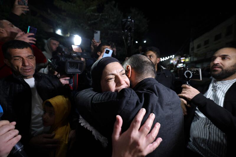 Rawda Abu Ajamieh is greeted by relatives and friends in the occupied West Bank after her release from Israeli detention as part of a temporary truce deal in the Gaza war. AFP