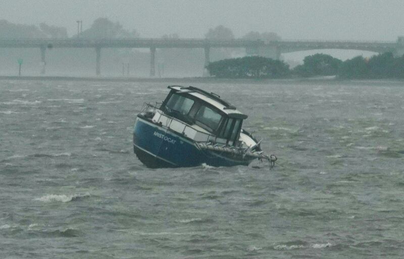 A boat rocks in the Gulf of Mexico in Dunedin, Florida, before Hurricane Ian makes landfall on Wednesday.  AFP