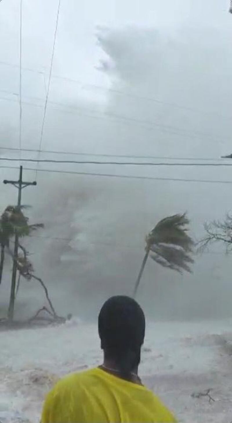 A person looks as Hurricane Iota makes landfall in San Andres, Colombia in this still image from video obtained via social media. Reuters