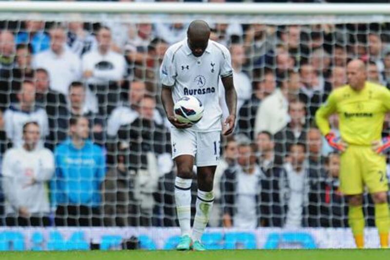 A dejected William Gallas walks away from the Spurs goal after seeing his side concede against former club Chelsea