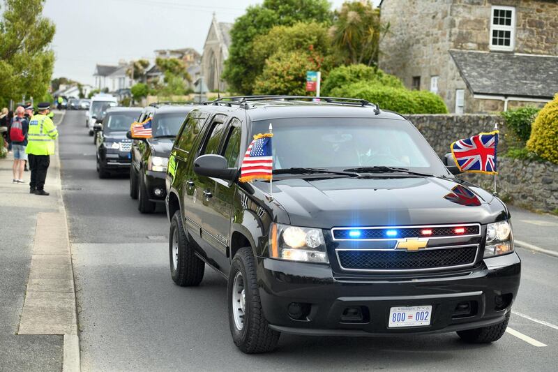 The motorcade of US President Joe Biden is driven through Carbis Bay, Cornwall on June 10, 2021, ahead of the three-day G7 summit being held from 11-13 June.  G7 leaders from Canada, France, Germany, Italy, Japan, the UK and the United States meet this weekend for the first time in nearly two years, for the three-day talks in Carbis Bay, Cornwall. - 
 / AFP / Oli SCARFF
