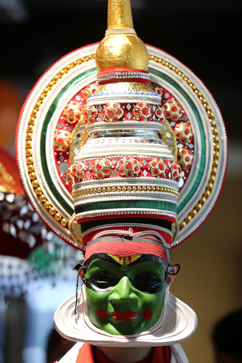 An artist gives a Kathakali performance, a form of classical Indian dance.