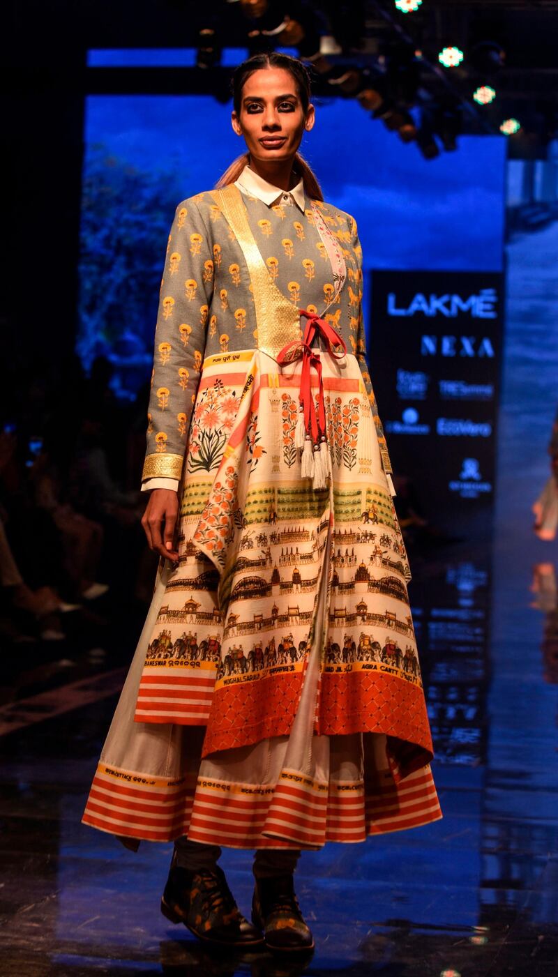 A model presents creations by designer Jajaabor during a fashion show at Lakme Fashion Week (LFW) Winter Festive in Mumbai on August 24, 2019.  - XGTY / RESTRICTED TO EDITORIAL USE
 / AFP / Sujit Jaiswal / XGTY / RESTRICTED TO EDITORIAL USE
