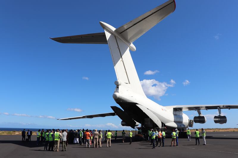 The plane being unloaded after landing in Comoros.