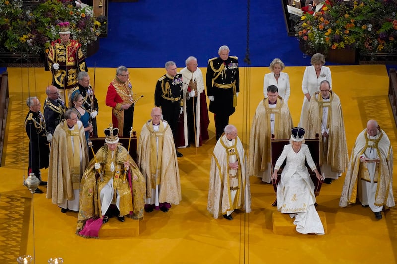 King Charles wearing the St Edward's Crown and Queen Camilla wearing the Queen Mary's Crown during the coronation ceremony. PA