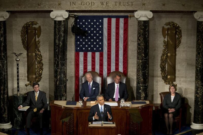 President Barack Obama delivers the State of the Union address to a joint session of the US Congress as Vice President Joseph Biden, top left, and house speaker John Boehner look on. Andrew Harrer / Bloomberg / January 20, 2015