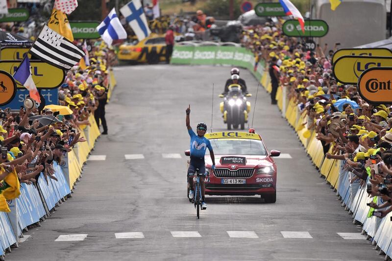 Colombia's Nairo Quintana celebrates after winning the 18th stage on July 25, 2019.  AFP