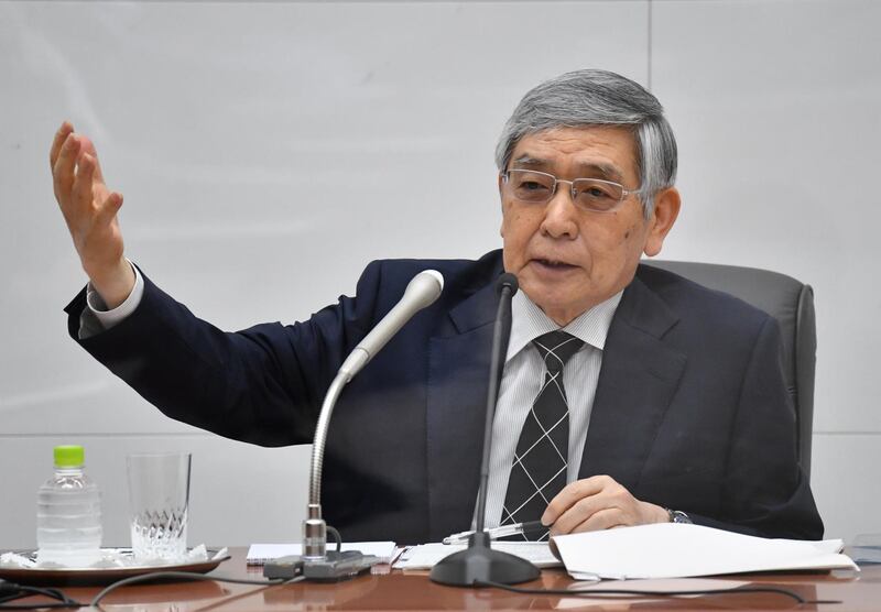 Haruhiko Kuroda, governor of the Bank of Japan (BOJ), gestures as he speaks during a news conference at the central bank's headquarters in Tokyo, Japan, on Friday, June 18, 2021. The Bank of Japan surprised investors by joining other central banks with a measure to combat climate change that shows it already has an eye on the issues facing a post-Covid world. Photographer: Koji Uema/The Nikkei/Bloomberg