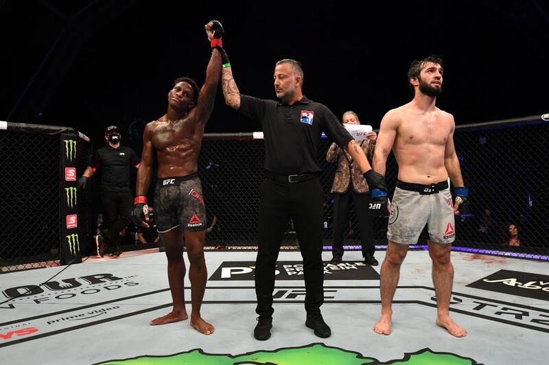 ABU DHABI, UNITED ARAB EMIRATES - SEPTEMBER 27:  (L-R) Hakeem Dawodu of Canada reacts after defeating Zubaira Tukhugov of Russia in their featherweight bout during UFC 253 inside Flash Forum on UFC Fight Island on September 27, 2020 in Abu Dhabi, United Arab Emirates. (Photo by Josh Hedges/Zuffa LLC)