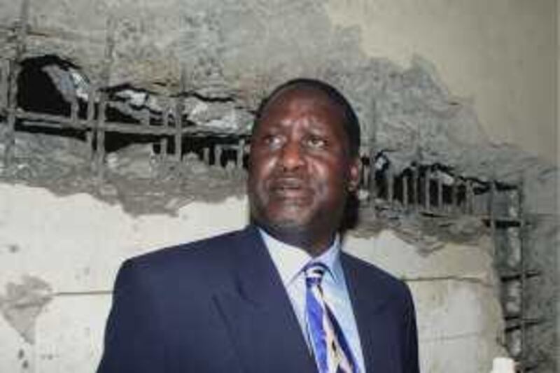 Kenya's Minister for Roads and Public Works Raila Odinga looks at the
torture chambers in the basement of Nairobi's Nyayo House, used by the
previous government to silence dissidents, February 13, 2003. Odinga
who himself spent time in Nyayo's cells, said Kenya would set up a
truth and reconciliation commission to help Kenyans deal with the
emotional wounds left by the previous government. A new government won
elections in Kenya in December, putting an end to 24 years of rule by
Daniel arap Moi. REUTERS/Antony Njuguna

AN/CMC