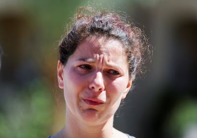 A Ukrainian tourist, Solomia, at the Egyptian Red Sea resort city of Hurghada, cries over the war in her country. Reuters.