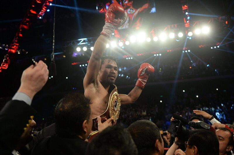 Manny Pacquiao won by scores of 120-110, 119-111 and 118-112 for a unanimous victory on Sunday. Dale de la Rey / AFP