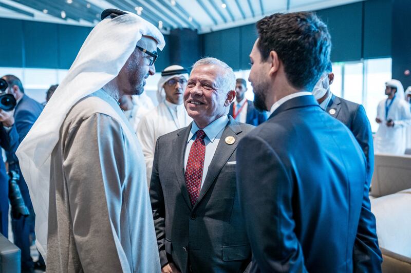 Sheikh Mohamed speaks with Jordan's King Abdullah II and Crown Prince Hussein bin Abdullah at the event. Reuters