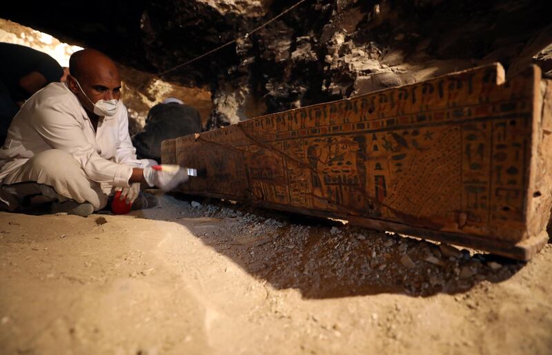 An antiquities worker brushes a coffin in the recently discovered tomb of Amenemhat, a goldsmith from the New Kingdom near the Nile city of Luxor, Egypt. Mohamed Abd El Ghany / Reuters