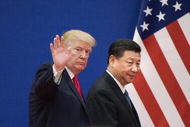 In this file photo US President Donald Trump and China's President Xi Jinping leave a business leaders event at the Great Hall of the People in Beijing on November 9, 2017. AFP