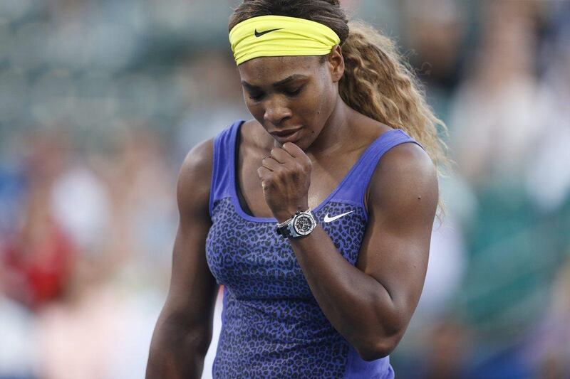 Serena Williams reacts during her second-round victory over Karolina Pliskova at the Stanford WTA tournament on Wednesday. Beck Diefenbach / AP / July 30, 2014