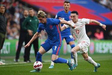 England's Conor Gallagher (L) in action against Switzerland's Ruben Vargas (R) during the International friendly soccer match England vs Switzerland at Wembley Stadium, London, Britain, 26 March 2022.   EPA / ANDY RAIN