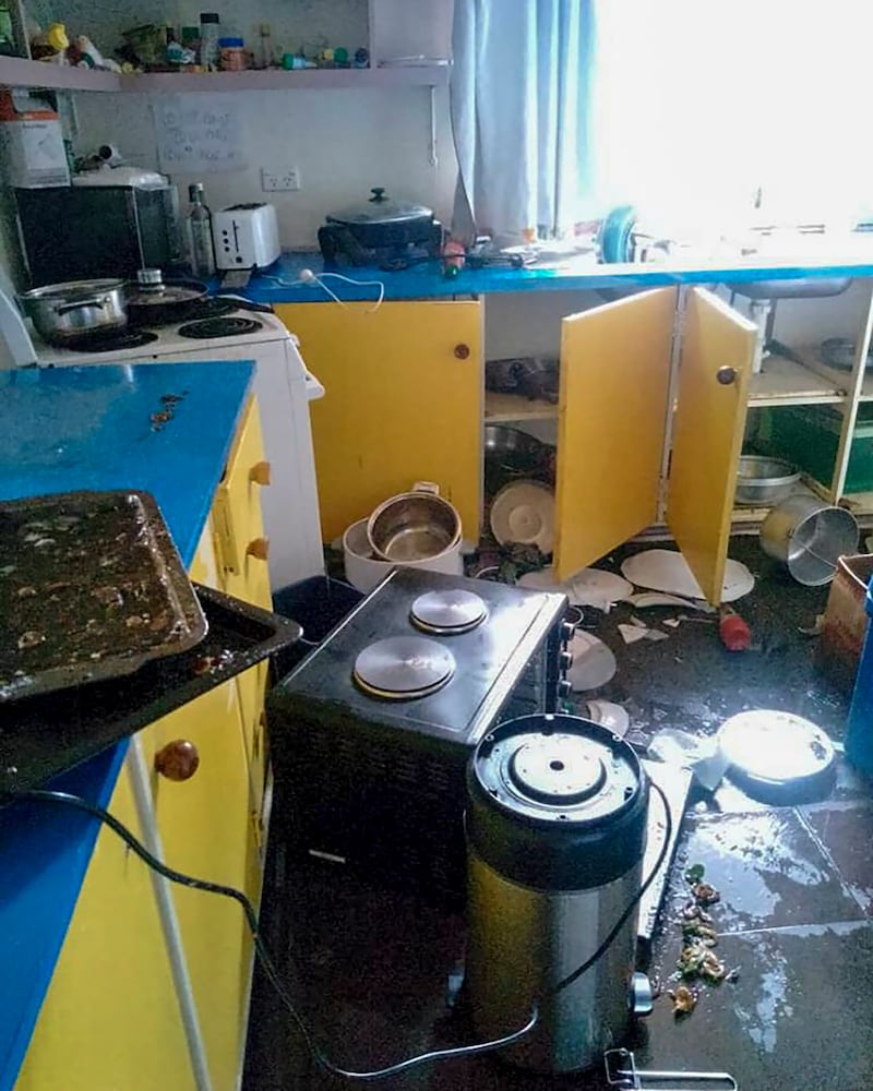 Debris lies strewn across the floor in the kitchen of Renagi Ravu's house in Kainantu, following Sunday's quake.