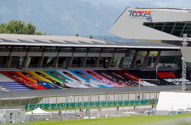 Pictures of drivers in the stands before the the first practice session at the Red Bull Ring racetrack in Spielberg, Austria, on Friday. AP