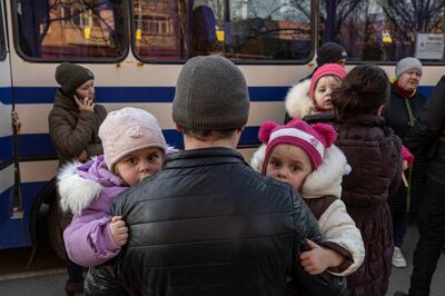 People fleeing Russian occupation arrive in the town of Brovary, near Kyiv. Reuters