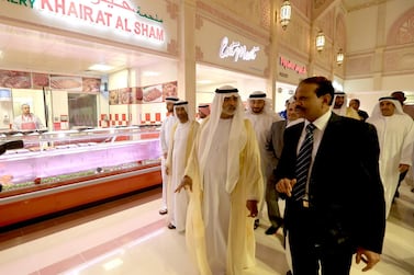 ABU DHABI - UNITED ARAB EMIRATES - 30APR2014 - Sheikh Nahyan Bin Mubarak Al Nahyan, Minister of Culture, Youth and Community Development with M. A. Yousuf Ali (R) Managing Director of EMKE LuLu Group of companies tours the Market after inaugurating at Mushrif Mall yesterday in Abu Dhabi. Ravindranath K / The National (for A&L section)