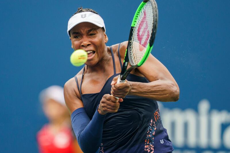 Venus Williams against Carla Suarez Navarro, of Spain, during a first round match at the Rogers Cup tennis tournament in Toronto, Tuesday, Aug. 6, 2019. Suarez Navarro defeated Williams 6-4, 6-2. (Mark Blinch/The Canadian Press via AP)