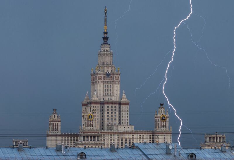 A lightning bolt strikes near Moscow State University building during a Russian thunderstorm. Reuters
