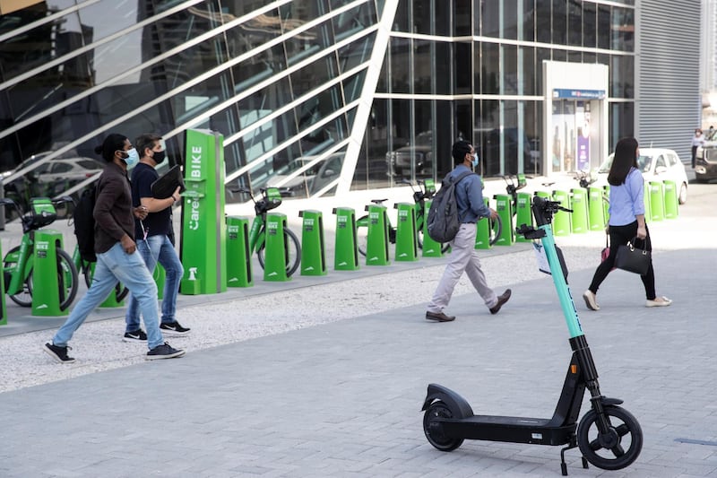 DUBAI, UNITED ARAB EMIRATES. 26 OCTOBER 2020. E-scooter trials rolled out in five areas across city for a year long project for commuters to rent and use e-scooters while commuting to and from tram and metro stations. A TIER e-scooter for rent at the DMCC Metro Station in JLT. (Photo: Antonie Robertson/The National) Journalist: Kelly Clarke. Section: National.
