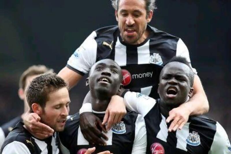 Papiss Cisse, centre, has provided fresh attacking impetus to an already fine Newcastle United team since joining in February. Scott Heppell / AP Photo