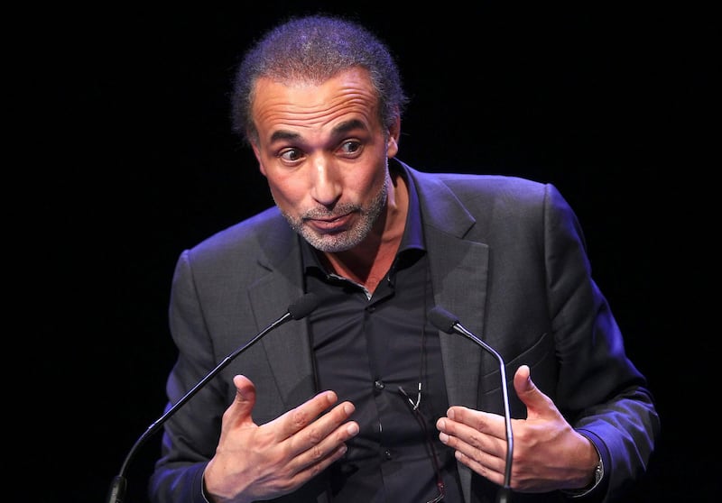 FILE - In this Feb. 7, 2016 file photo, Muslim scholar Tariq Ramadan delivers a speech during a French Muslim organizations meeting in Lille, northern France. The lawyer representing an accuser of prominent Islamic scholar Tariq Ramadan, who was jailed in February amid an investigation into two alleged cases of rape, says he has been released on bail. (AP Photo/Michel Spingler, File)