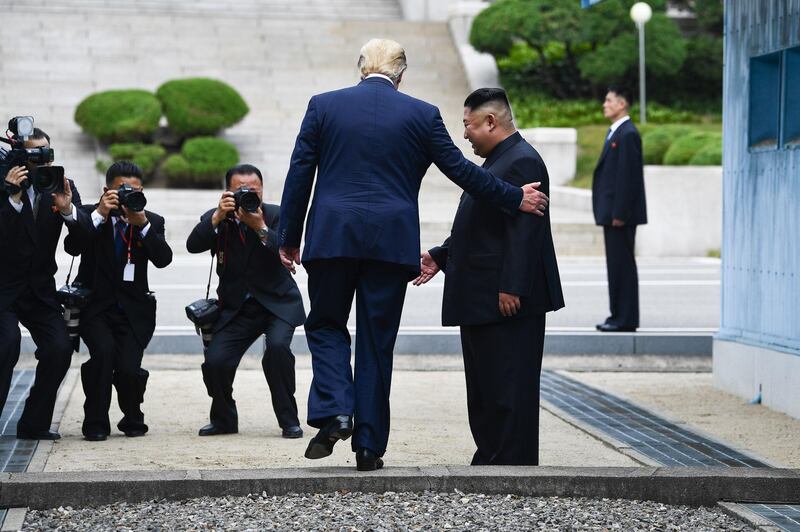 US President Donald Trump meets with North Korean leader Kim Jong-un at the demilitarised zone separating the two Koreas, in Panmunjom, South Korea. AFP